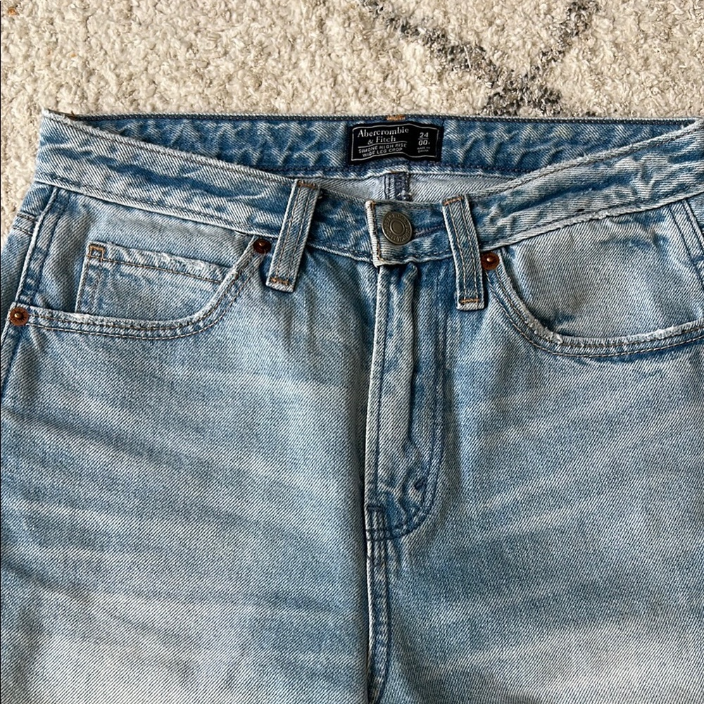 High Rise Blue Jeans with Vintage-Inspired Wash